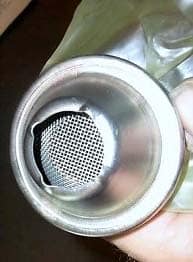 A Volkswagen car's exhaust pipe