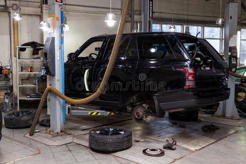 novosibirsk-russia-used-black-car-land-rover-range-rover-disassembled-bumper-wheels-four-post-lift-repairing-167999066 – German Car Depot land rover repair service